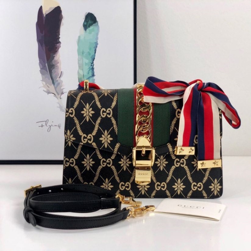 G*u*i satchel bags